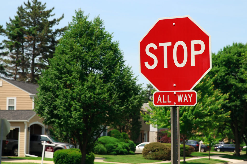 stop sign at or on the line mistake of law
